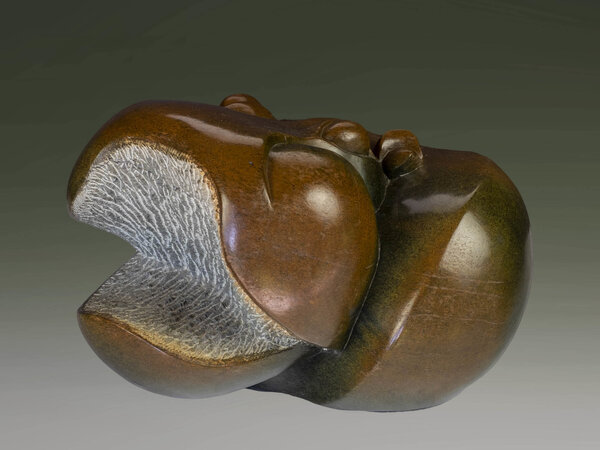 Stenen tuinbeeld uniek, Laying hippo, nijlpaard 